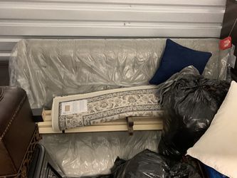 **Clearing storage locker** (Queen Mattress, bed, couch , coffee table storage chest & area rug) Thumbnail