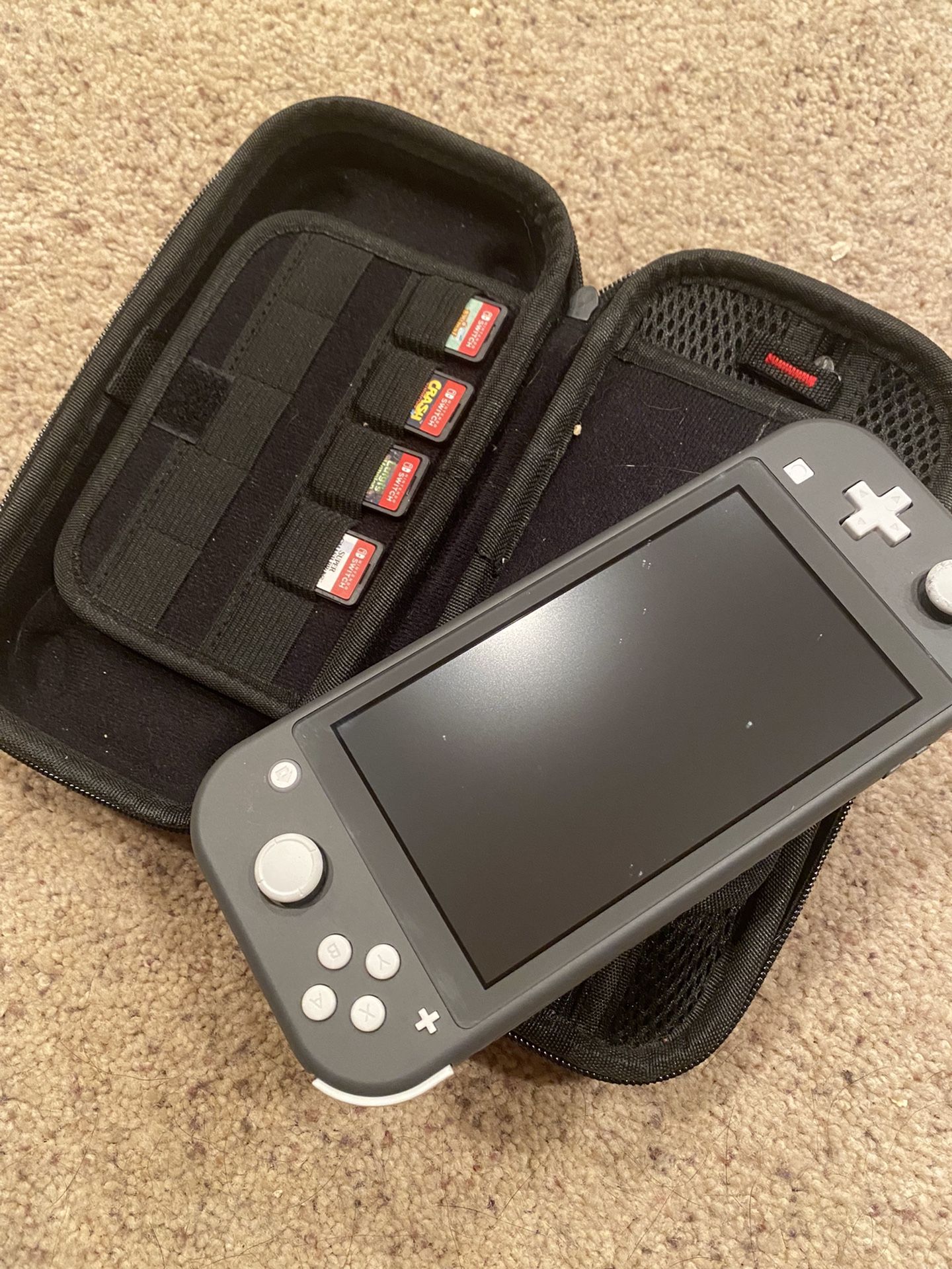 Gray Nintendo Switch Lite w/ Heavy Duty Case And 4 Games