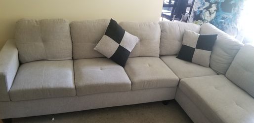 L Shaped Grey Couch Thumbnail