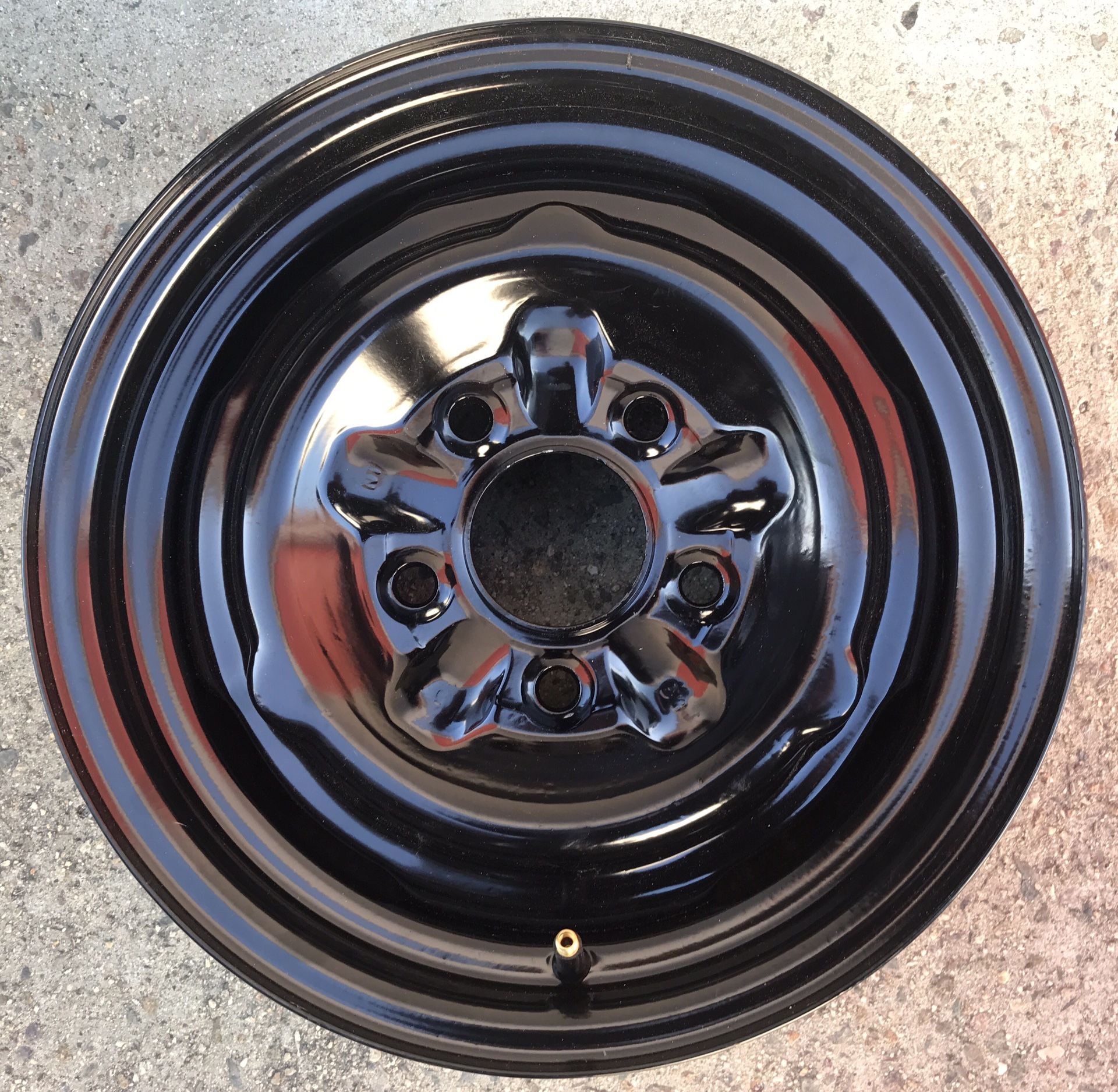 ONE GM FIVE LUG 14" RIM JUST SAND BLASTED AND POWDER COATED BLACK
