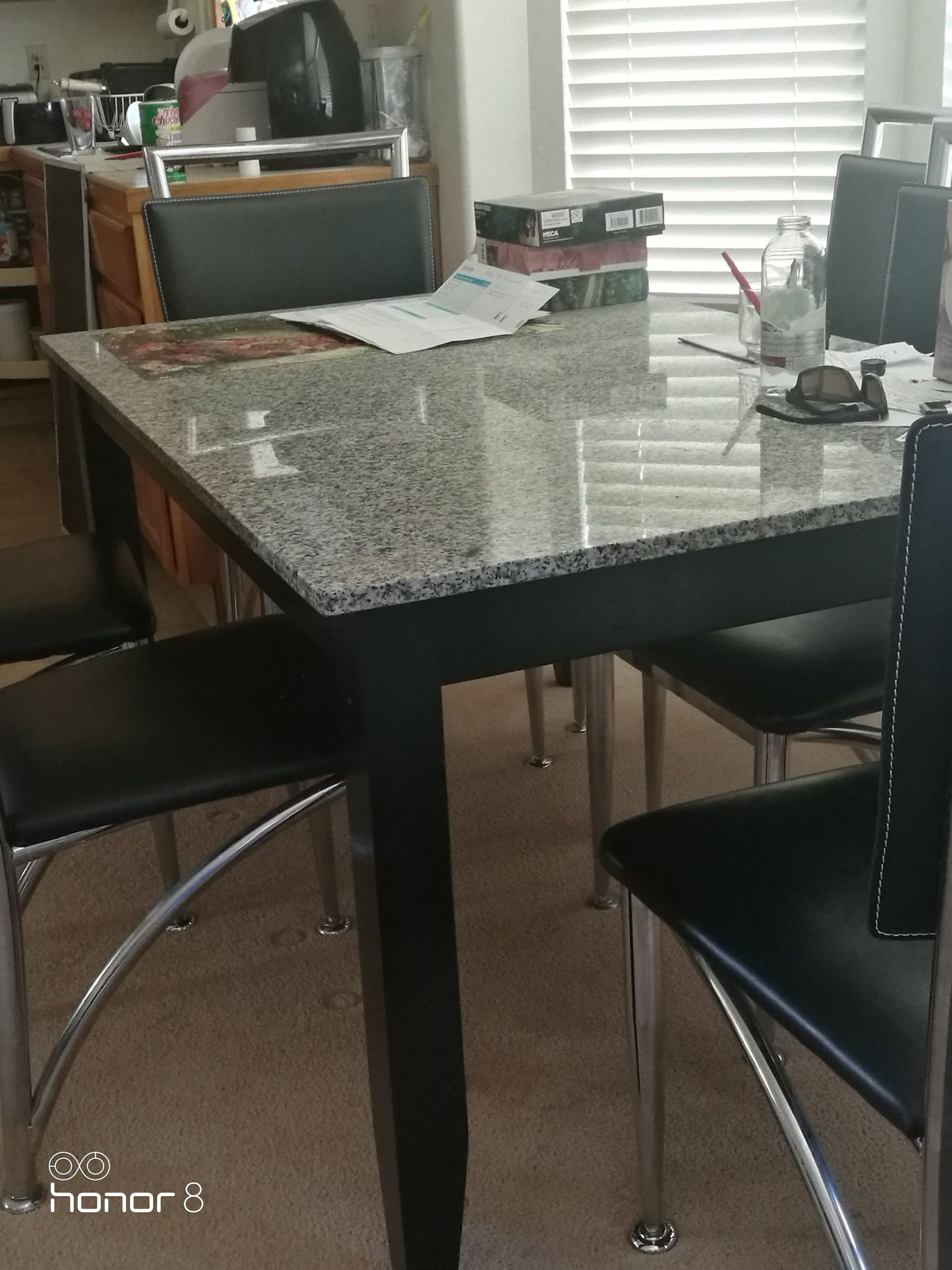 Granite Table With 6 Leather Chairs