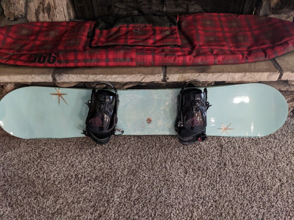 Snowboard, bindings, bag