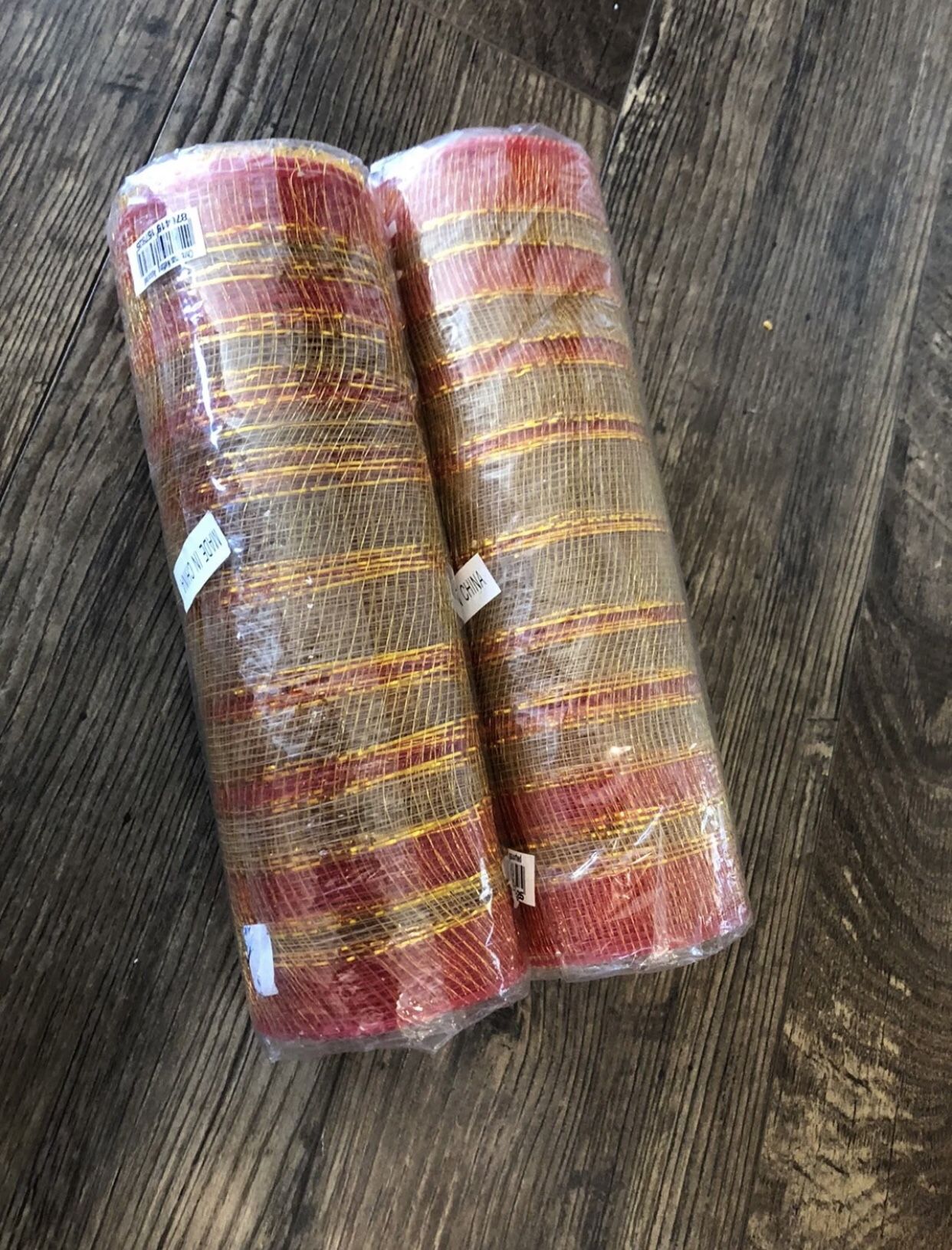 NWT 4 Rolls of 10” X 30’ Orange & Tinsel Gold Stripe Poly Deco Mesh Decor Netting. Note: The measures are approximation since no measurements are pr