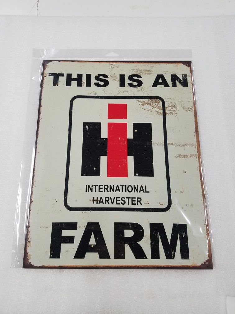 This is a international harvester farm tractor metal sign