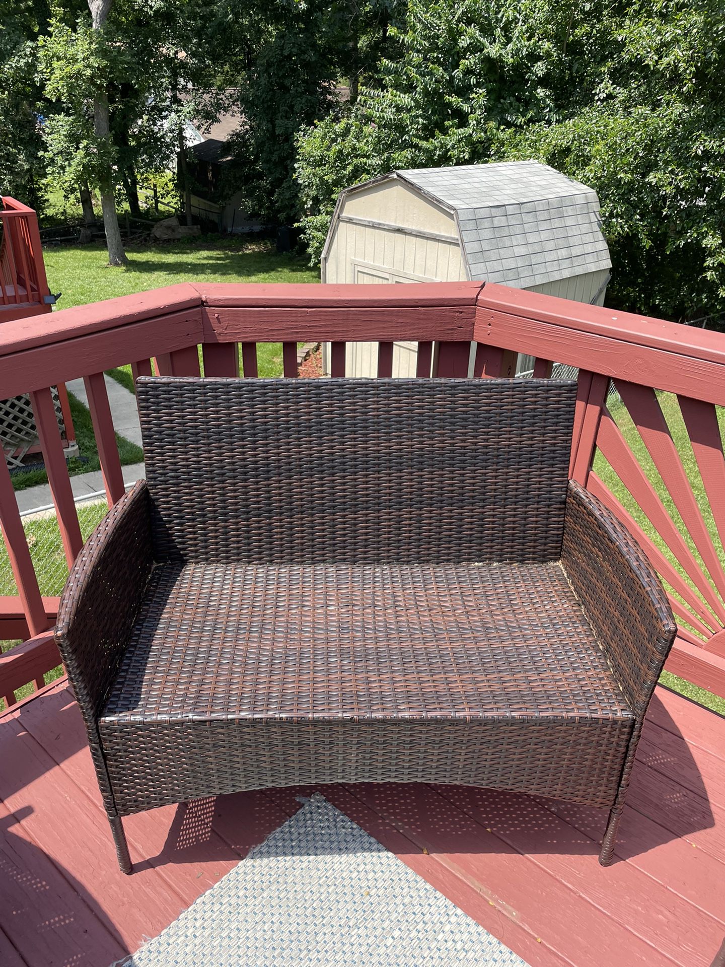 Four piece brown wicker patio set