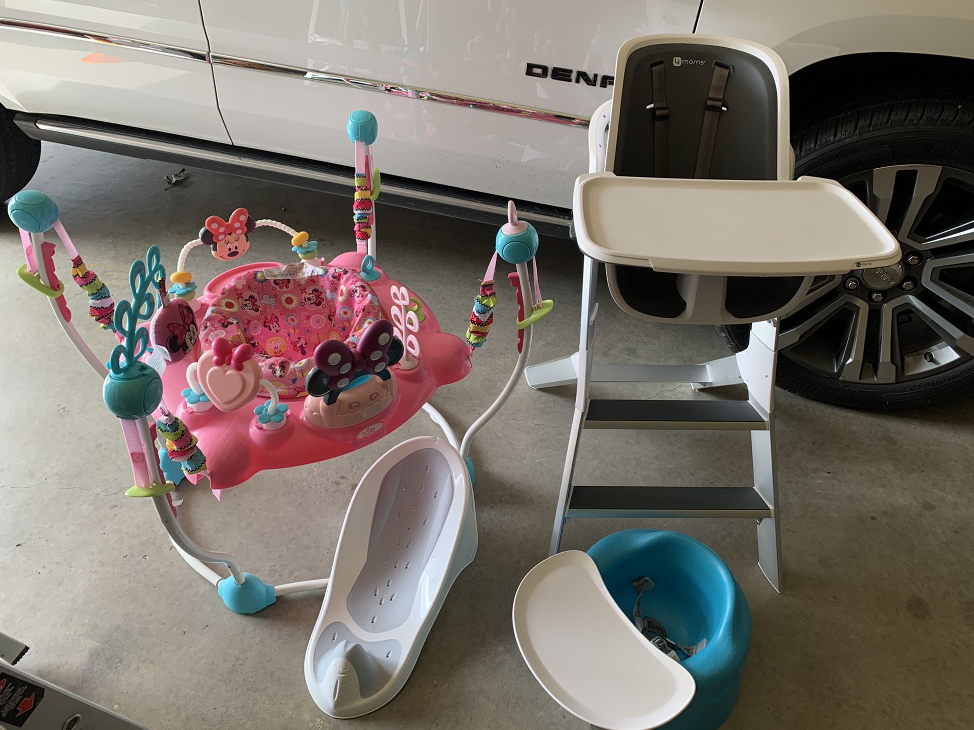 Baby jumper, formoms high chair, shower/bath lounger and a bumbo chair