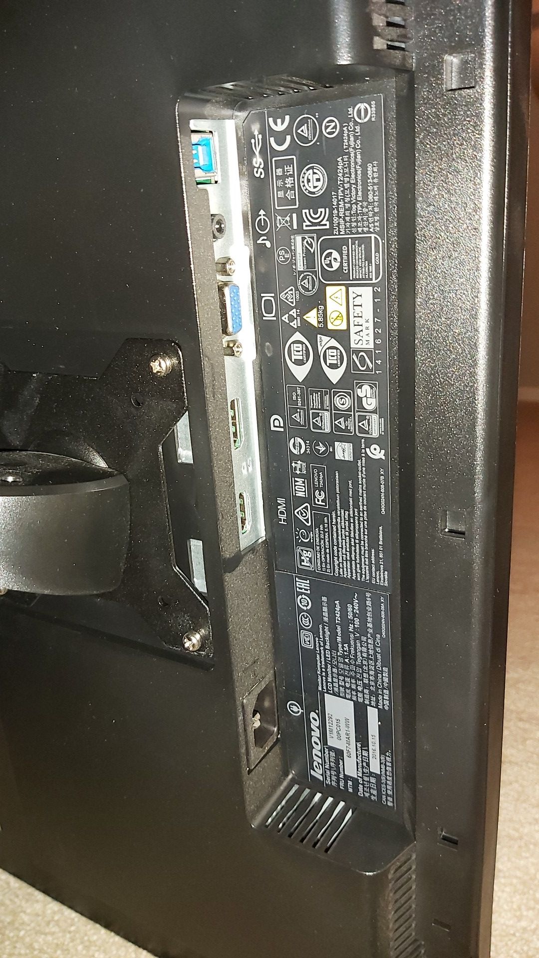 Lenovo dual monitor setup with stands and cables