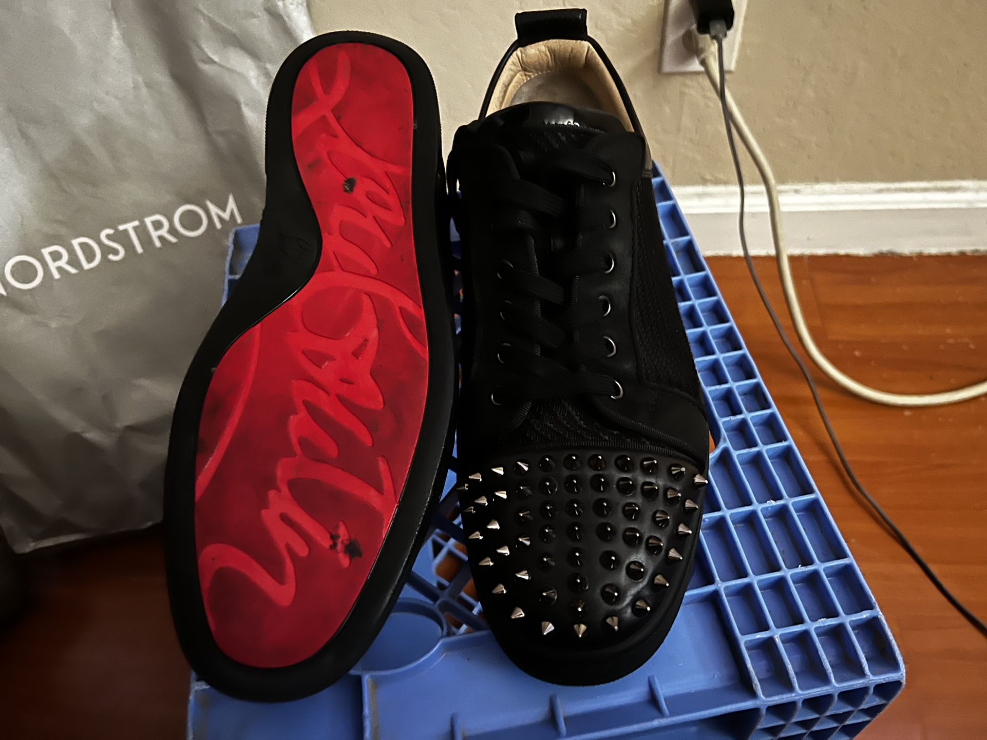 Low top Christian Louboutin/Red bottoms 