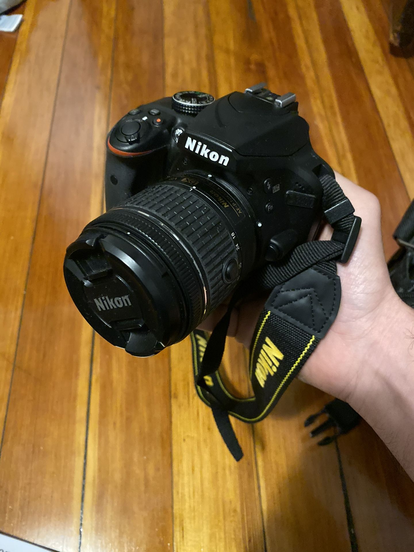 Nikon D3400 DSLR camera with accessories