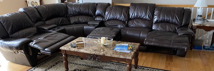 Leather Couch with 3 Built In Manual Recliners, 4 Drink Holders And 2 Storage Areas Thumbnail
