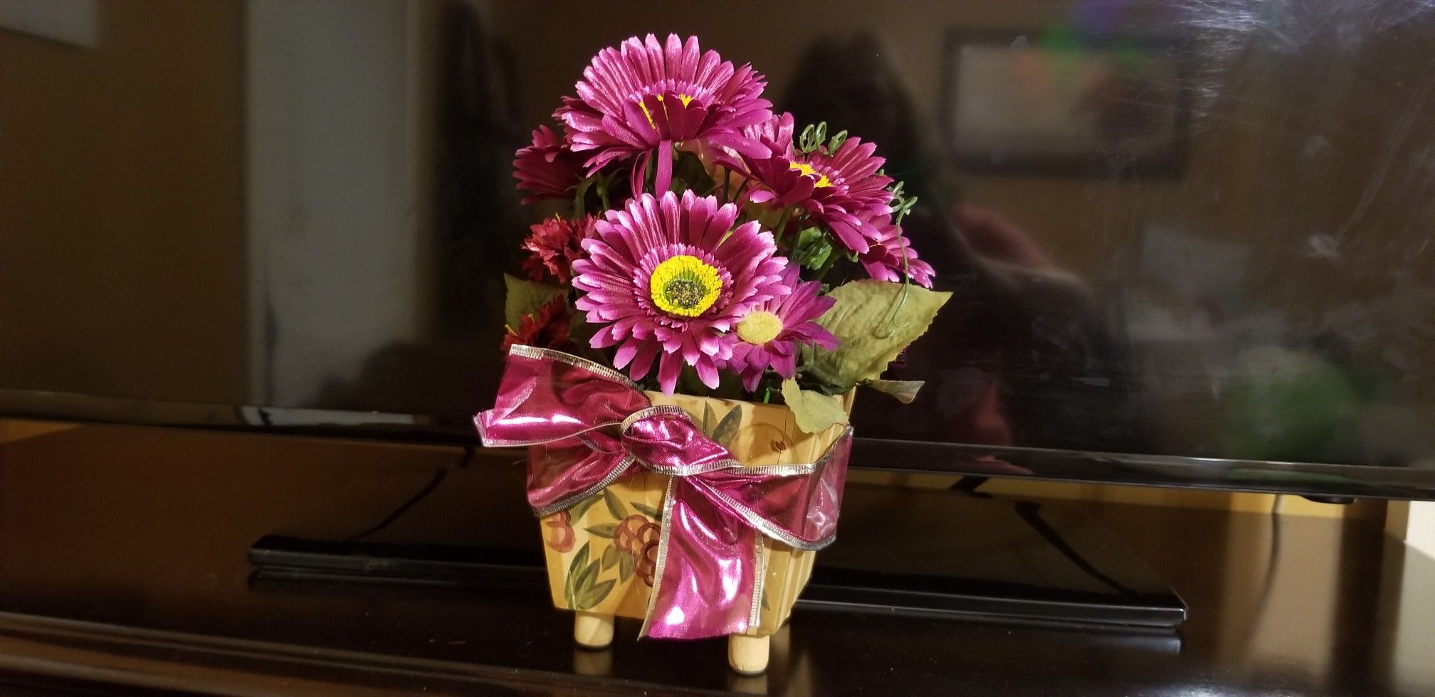 flowers in wooden vase