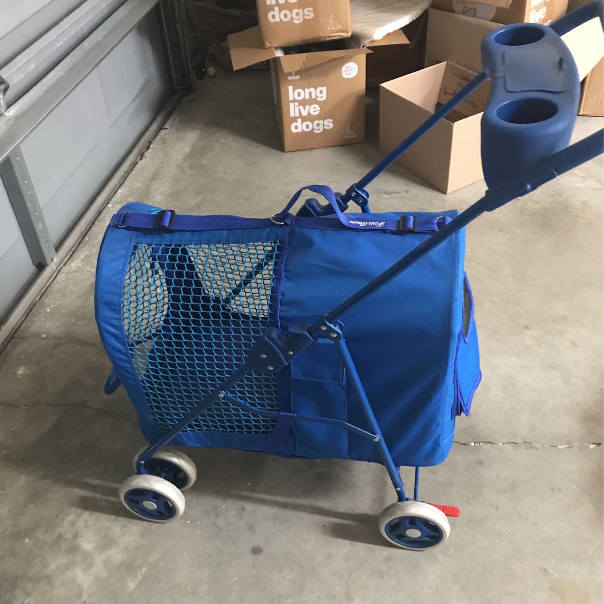 Doggy stroller by four paws used once $50