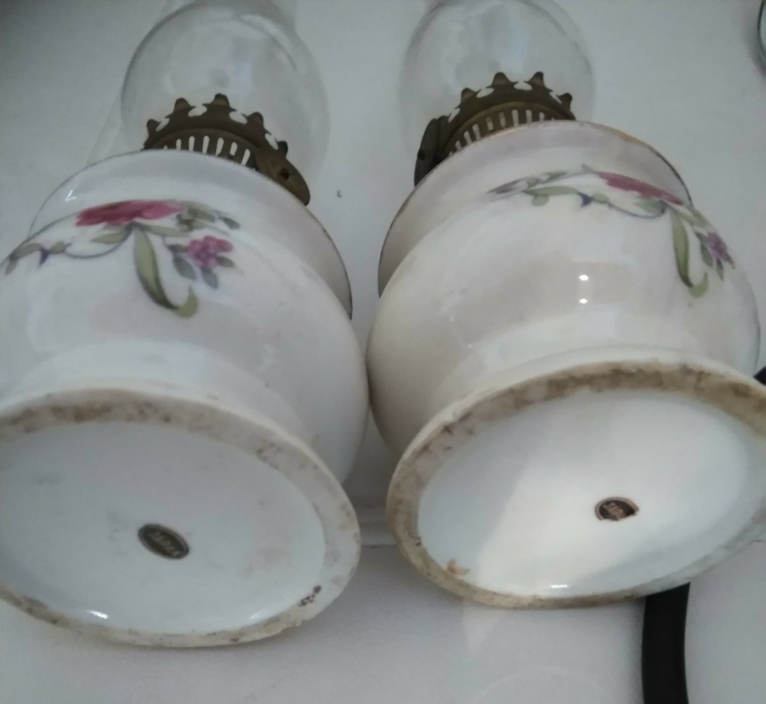 2 vintage hurricane lamps