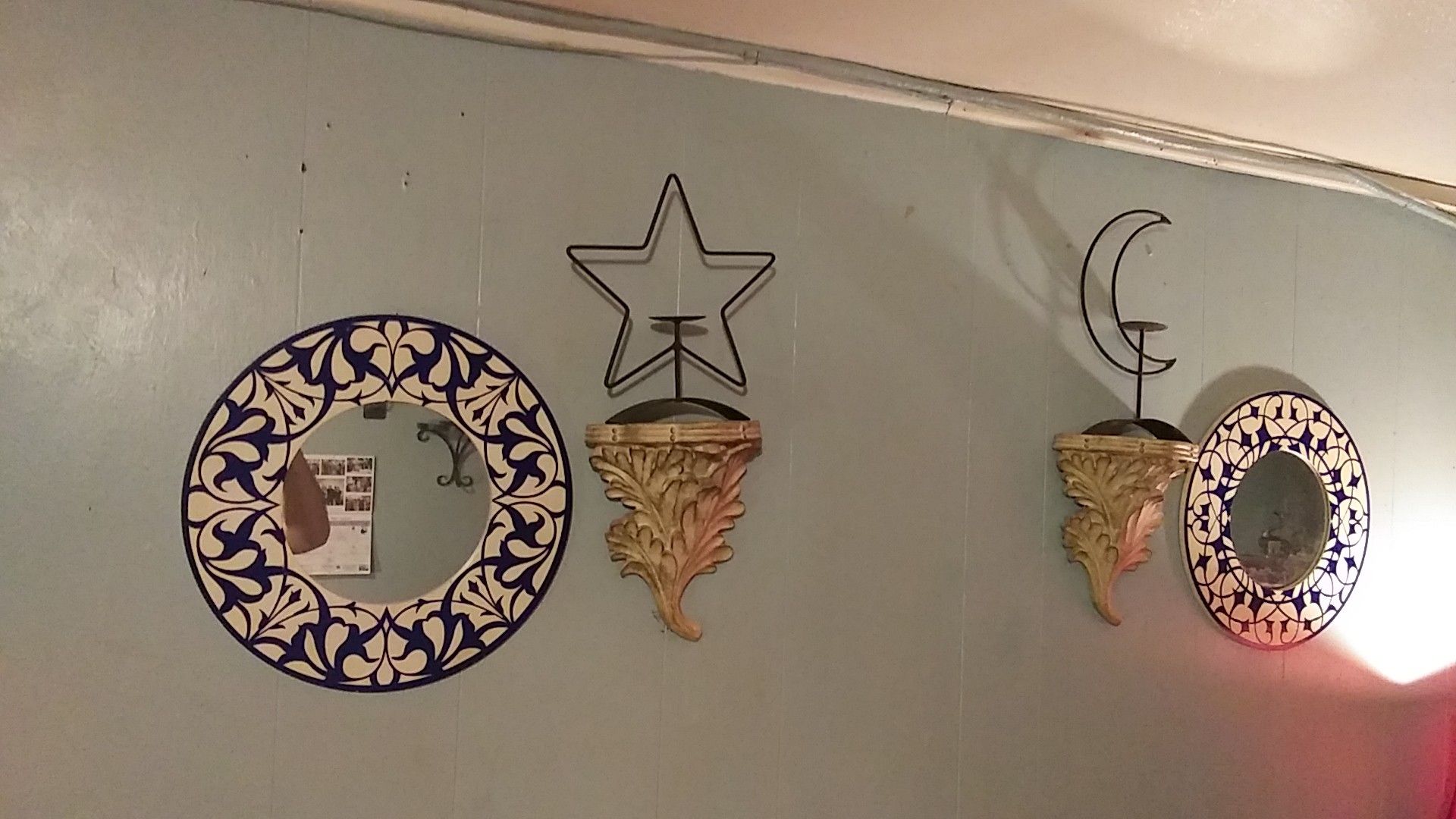 Set of decorative mirrors shelves and candle holder