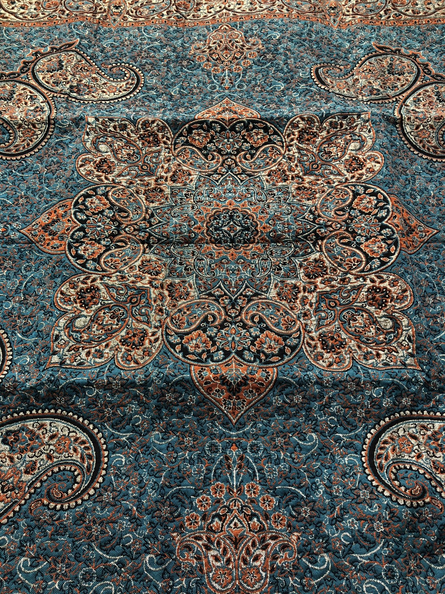 Elegant blue and gold table cover with many details