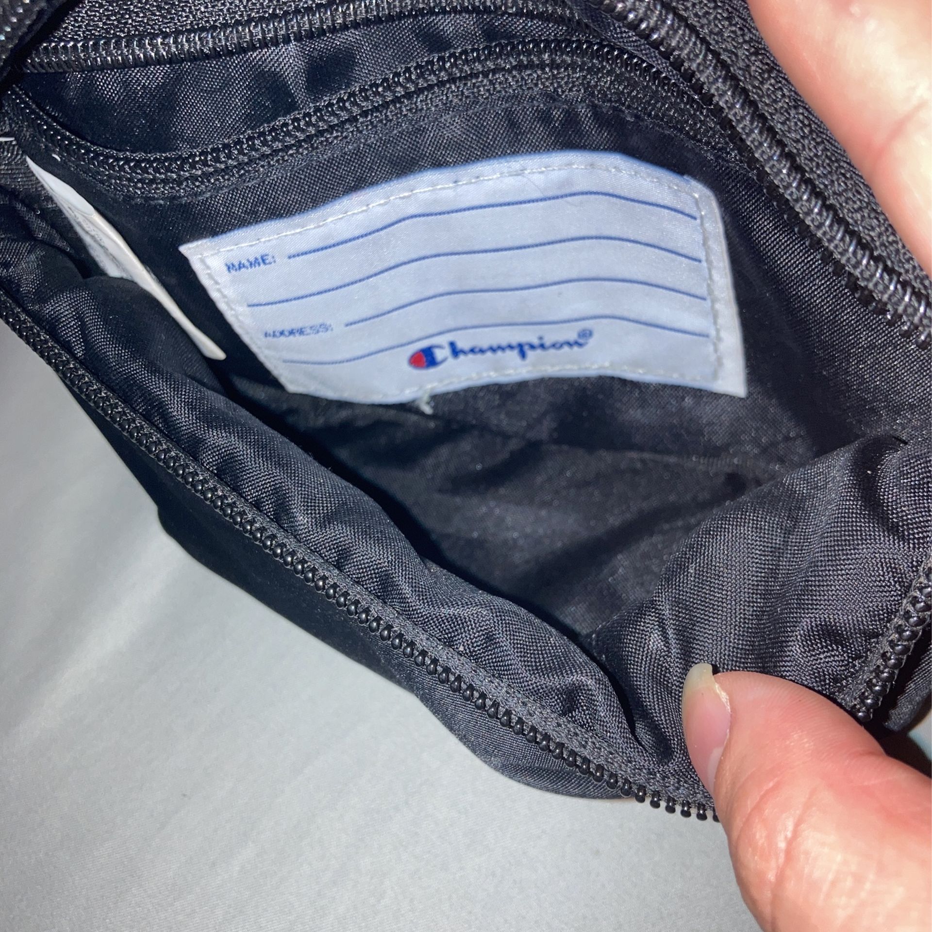 small black champion waist bag