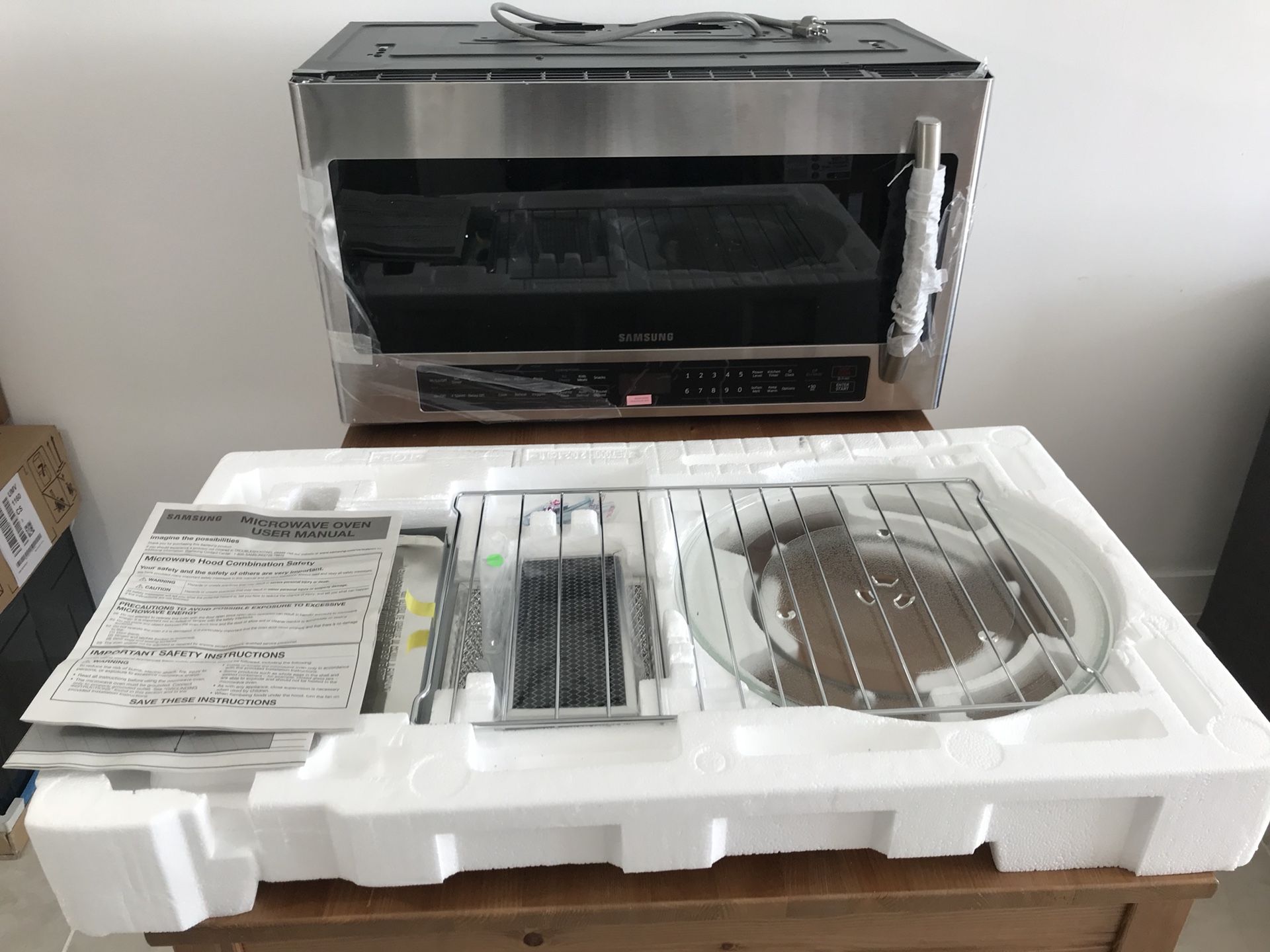 New Samsung OTR microwave ME20H705MSS + FREE delivery and installation