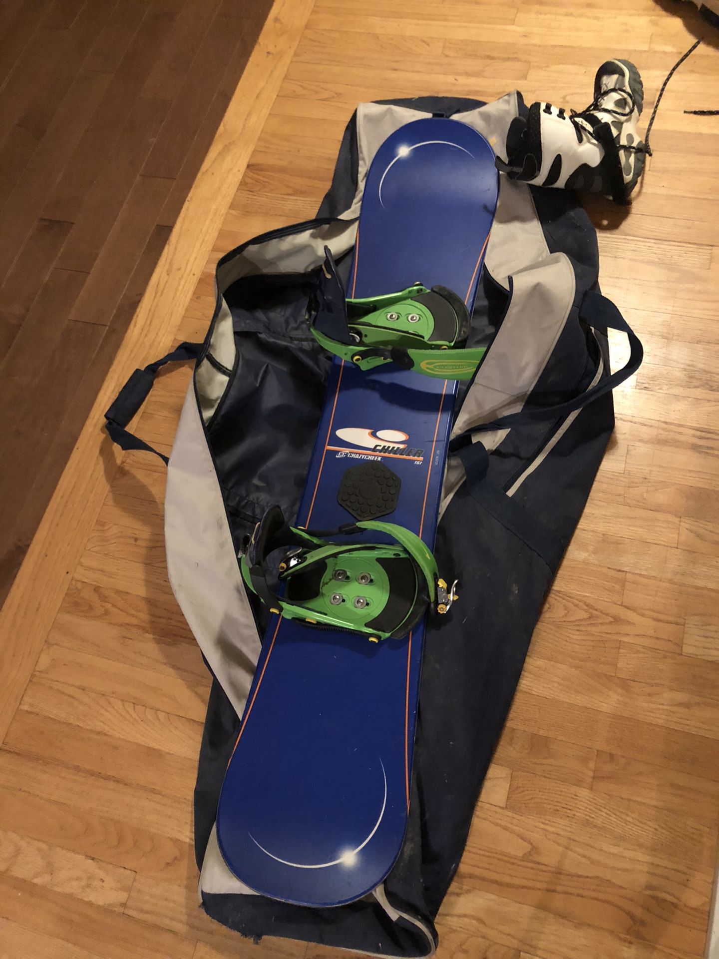 Snowboard with boots and bag