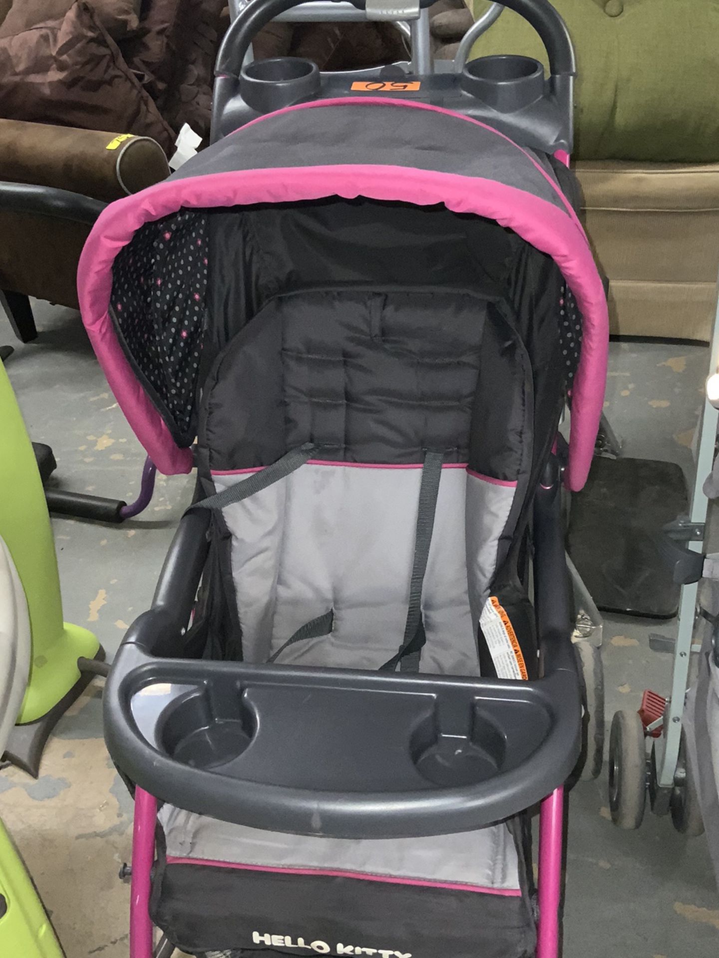 Pink And Black Hello Kitty Stroller