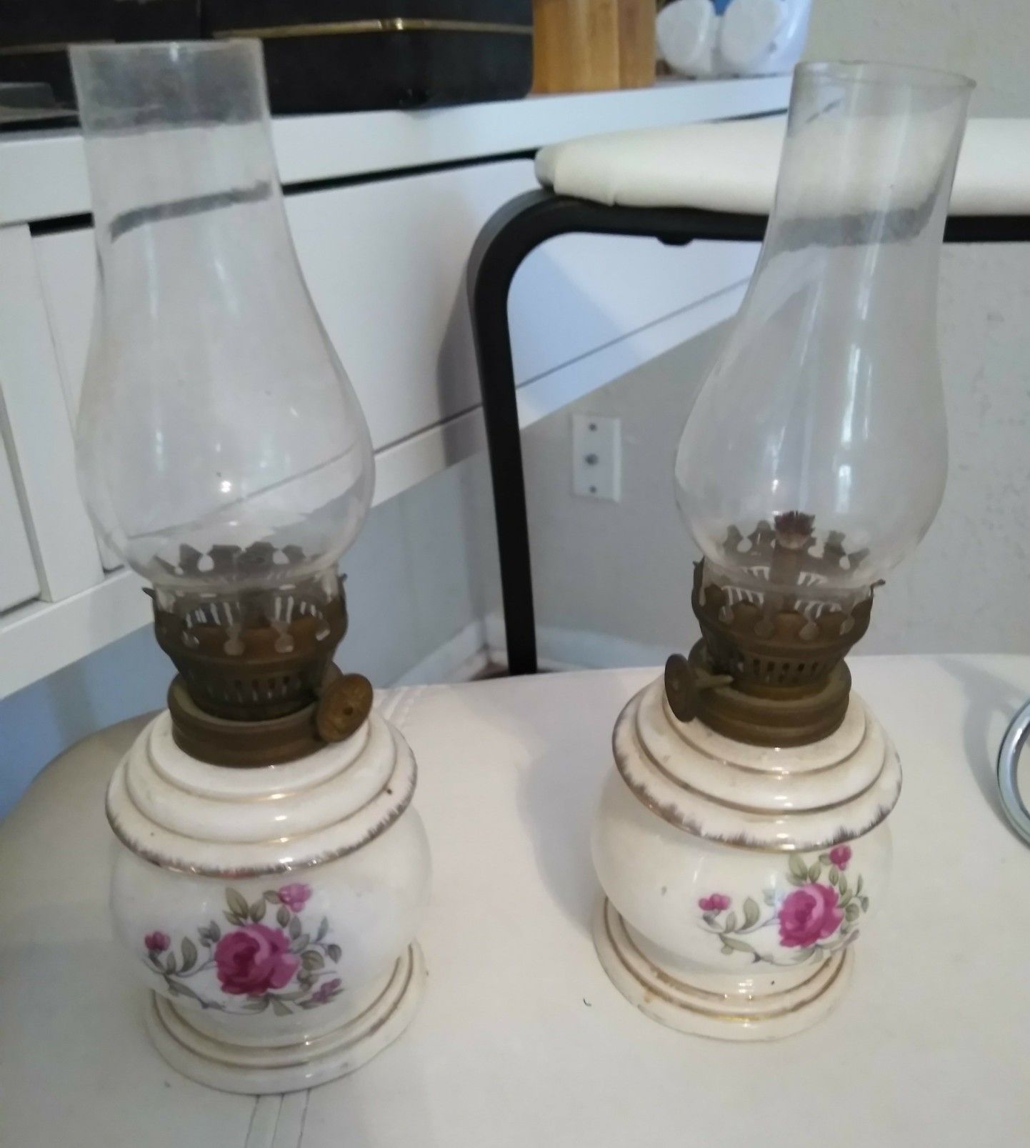 2 vintage hurricane lamps