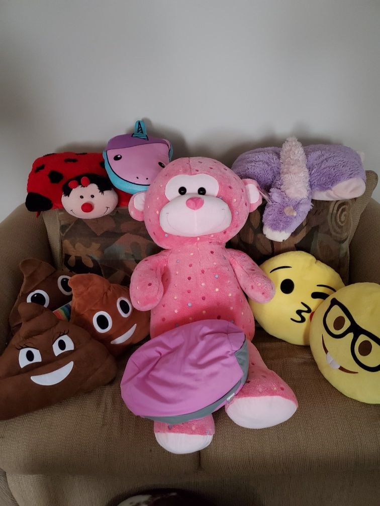 Large Stuffed Bear and several pillows