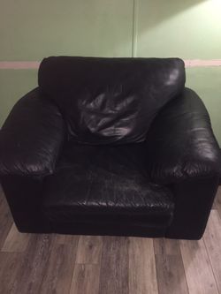 Black leather love seat and oversized chair Thumbnail