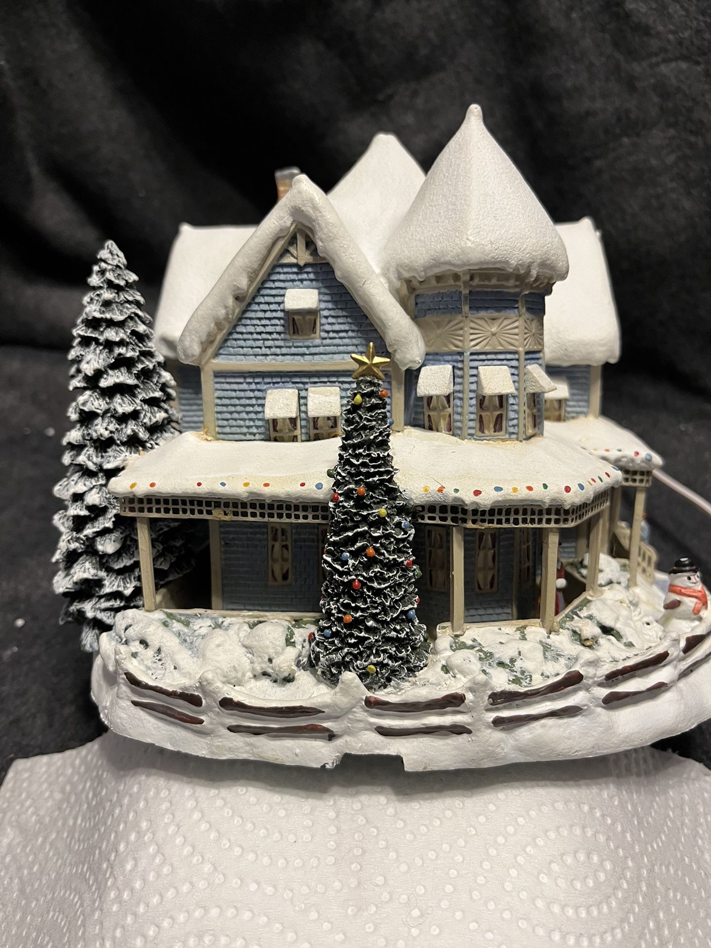 7 “Thomas Kinkade ‘s “ Village Christmas Collection , Each Come with cord that allows them to light up with switch