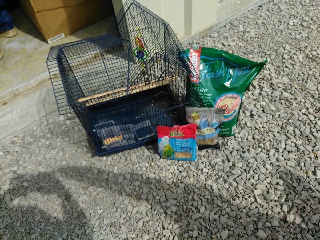 Bird cage and stuff to go with it
