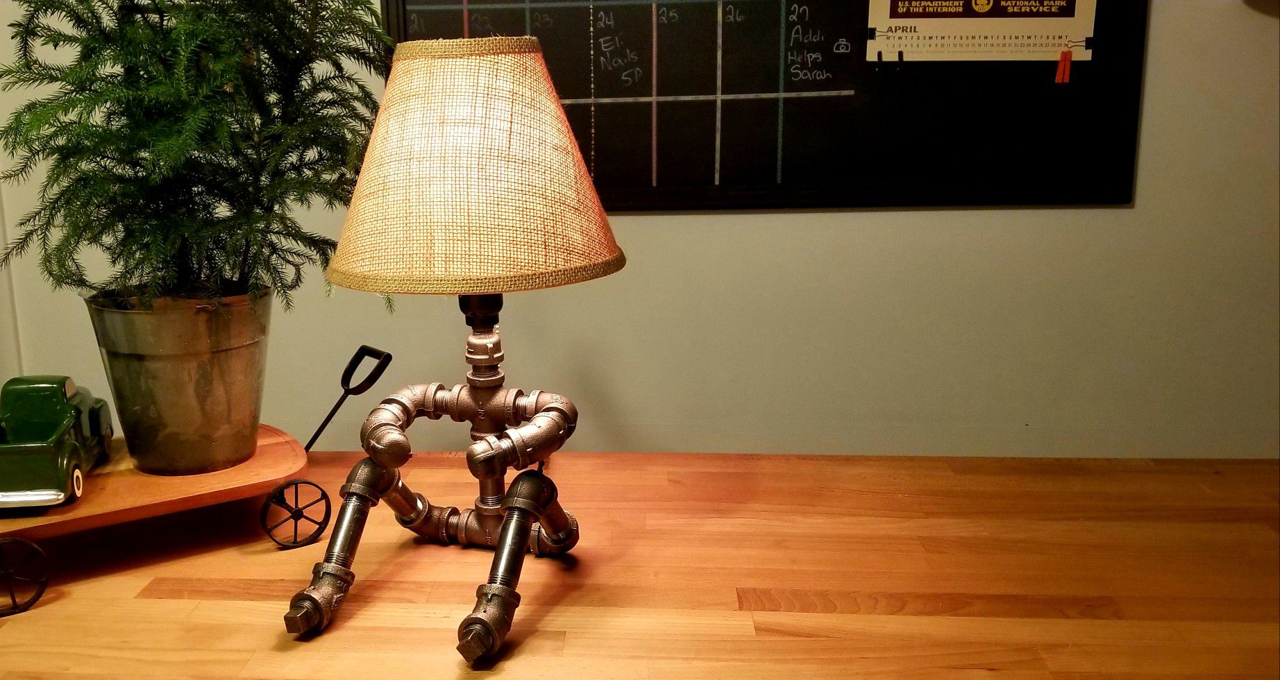 Industrial steel "person sitting" desk table lamp