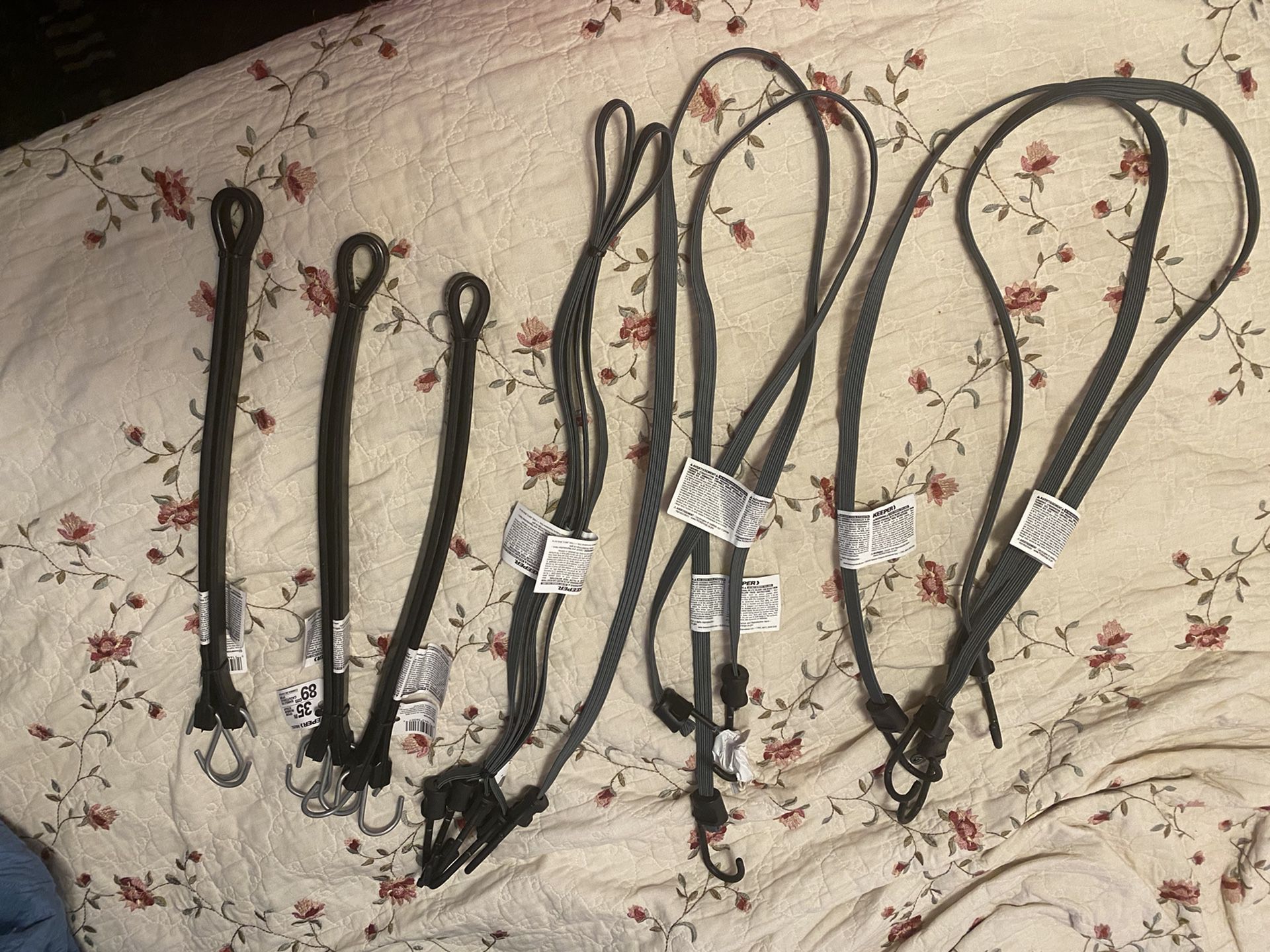 $30. (firm on price)-Nine long rubber/bungee straps. Brand new tags still on them. Paid $42 asking $30.