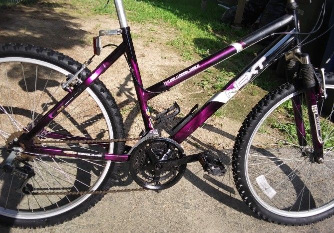 Next 26 in 18 speed Ultra all terrain, shock system, all Shimano equipped, Shimano derailleur sis EST extreme shock, Promax brakes, grips Promax brake