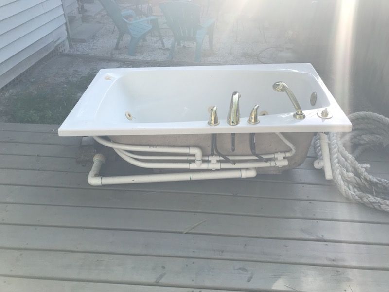 Jacuzzi tub for sale comes already plumbed with electric and motor