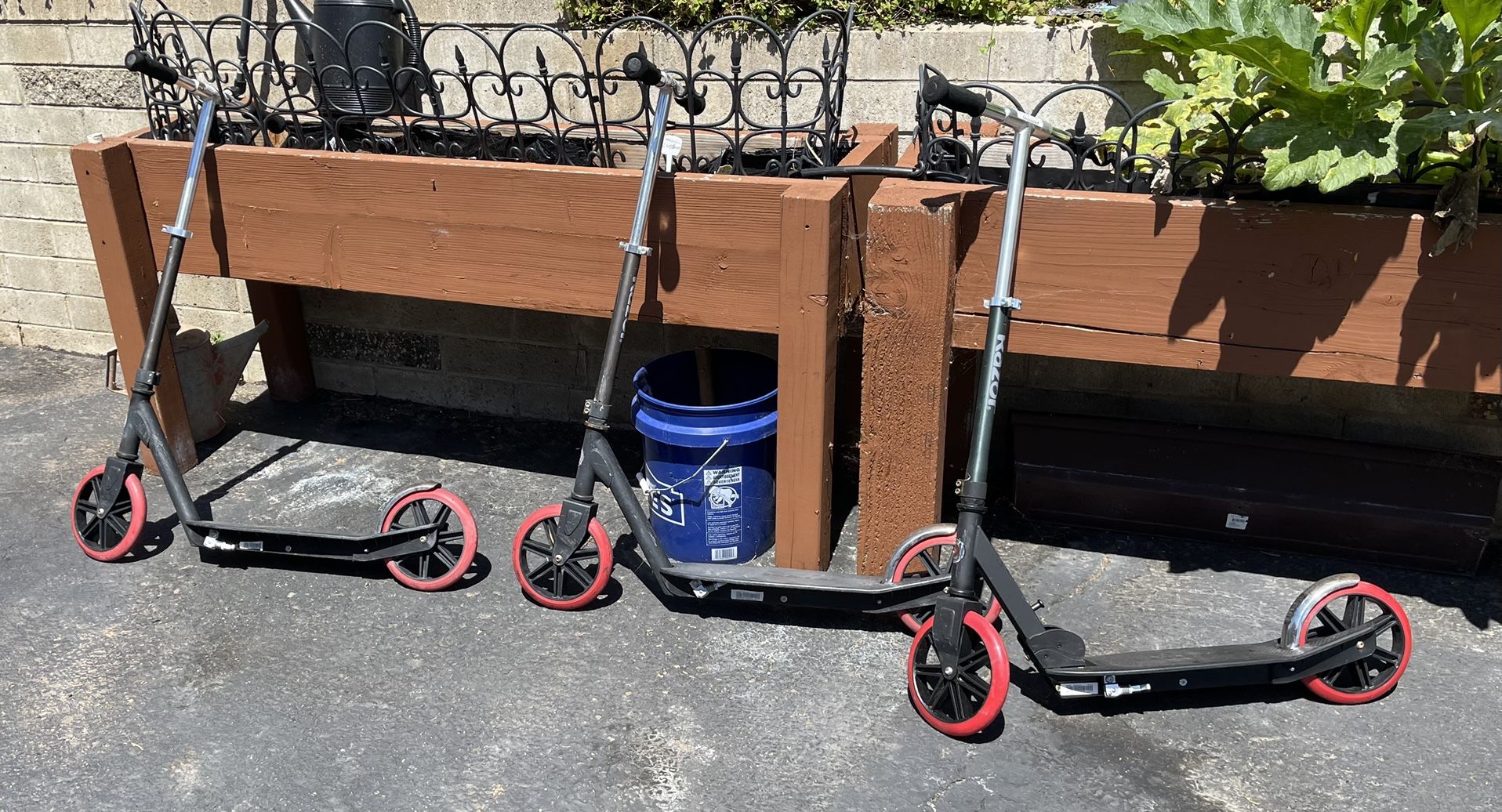 Two (2) Razor Carbon Lux Kick Scooter, Black/Red. Hardly used at all. $40 each or $70 for two