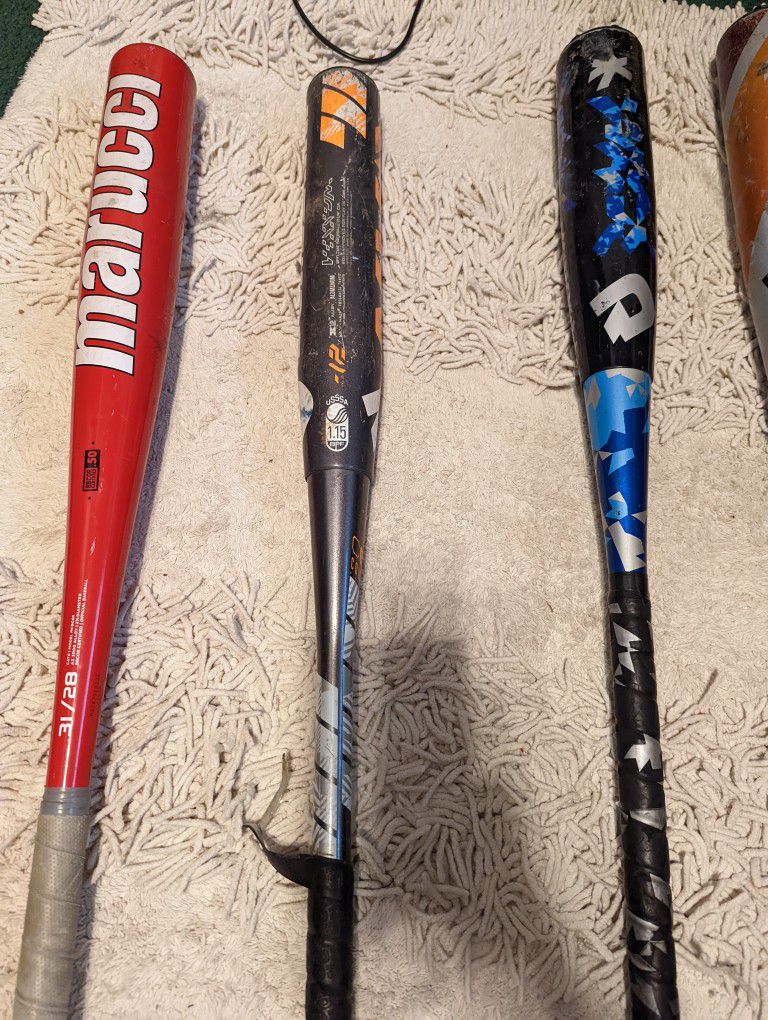 Lot of baseball bats