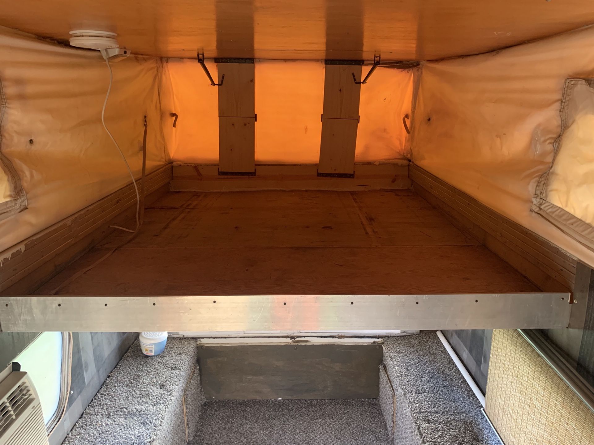 Pop up truck bed camper topper