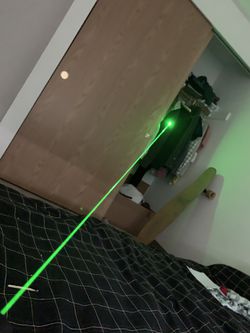 Very Powerful Burning Green Laser Pointer with battery, charger, star cap, and safety keys feature  Thumbnail