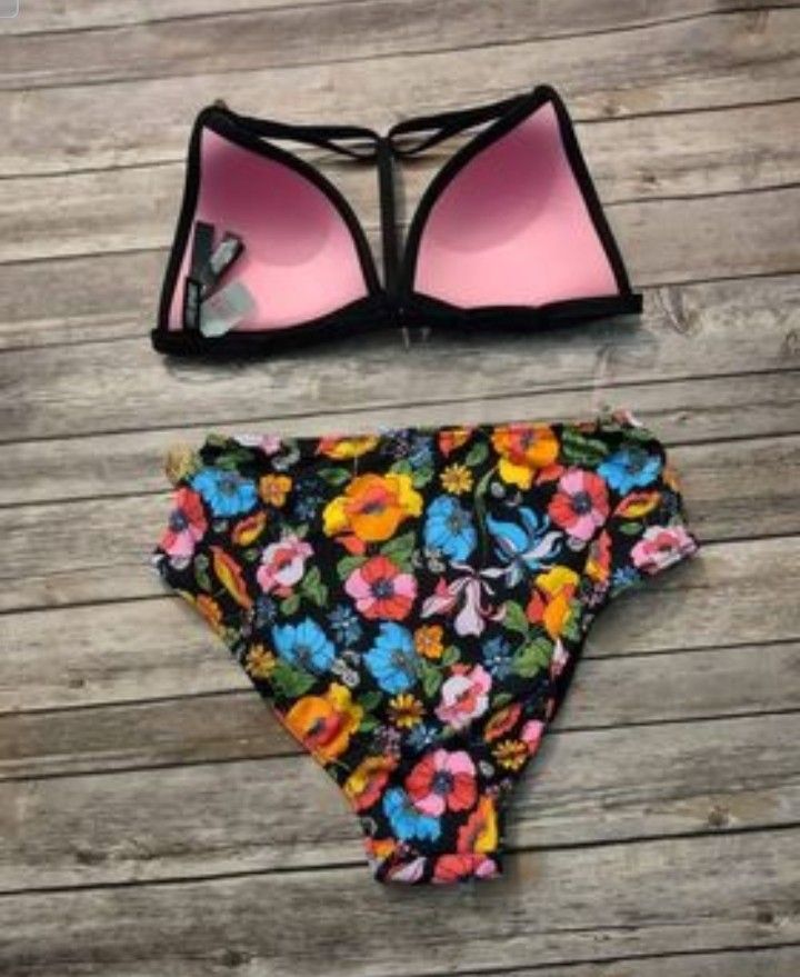 A black bathing suit multiple colors
