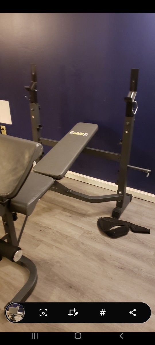 Weight Bench With Bar And 2 25lbs Plates
