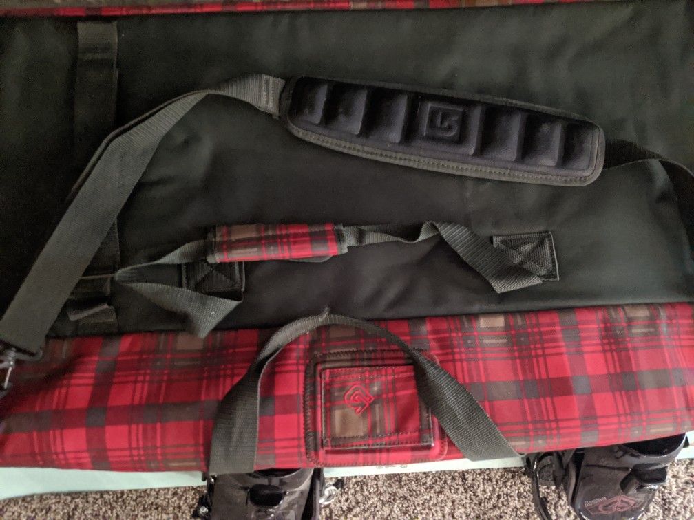 Snowboard, bindings, bag