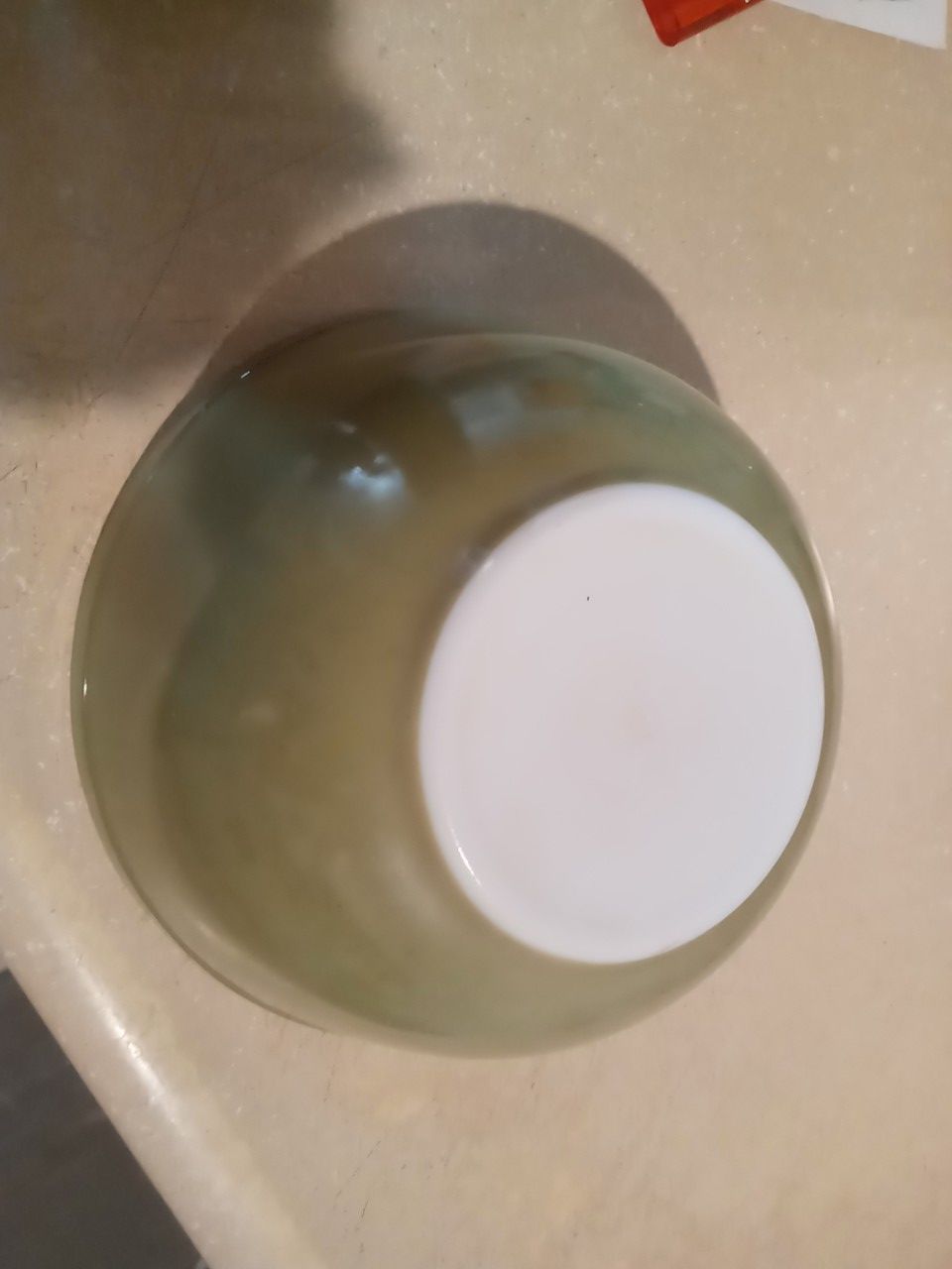 Vintage avocado green Pyrex mixing bowl 9"×5"
