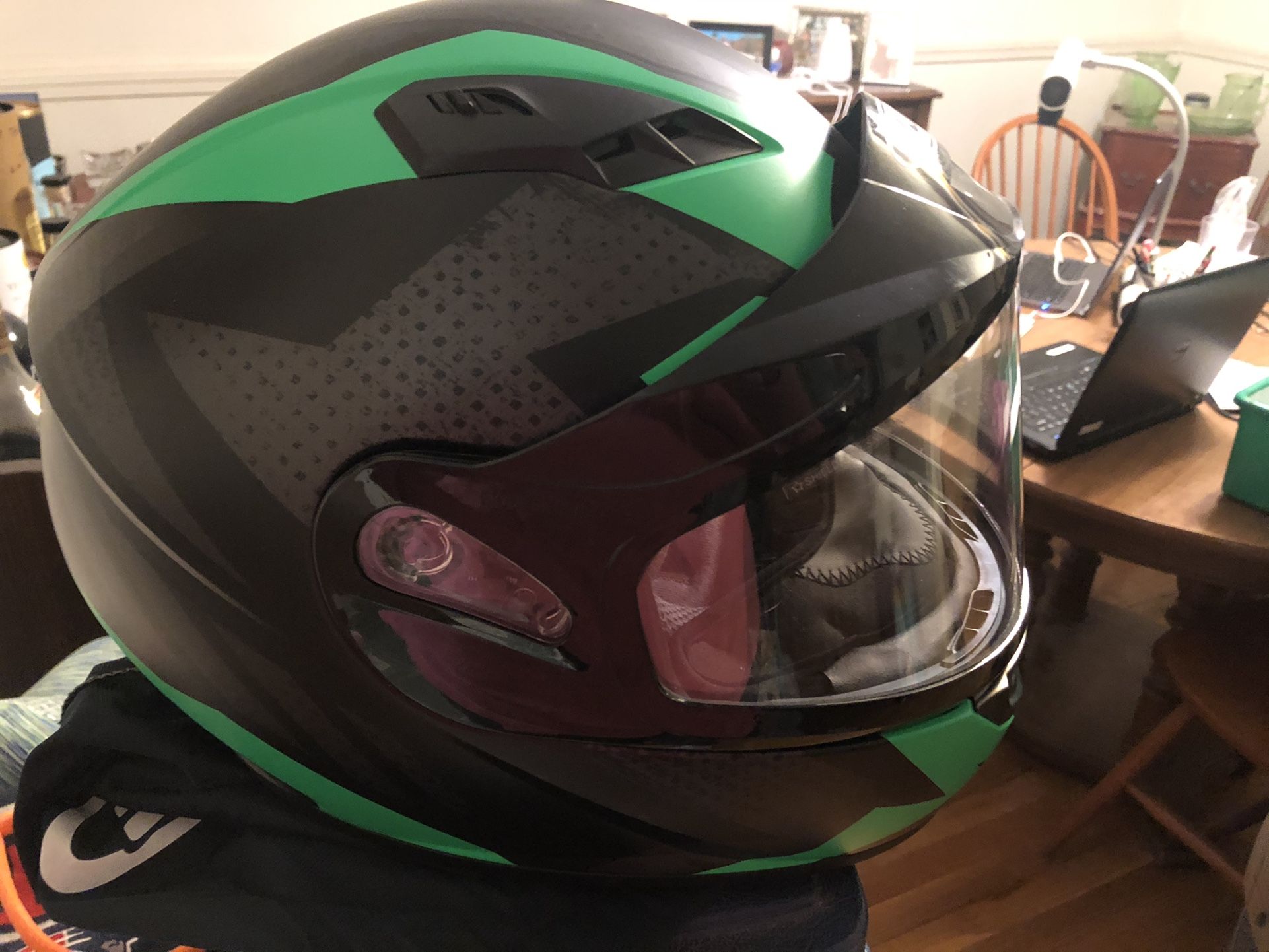 Size medium Snowmobile Helmet and kids size 10 Pants .