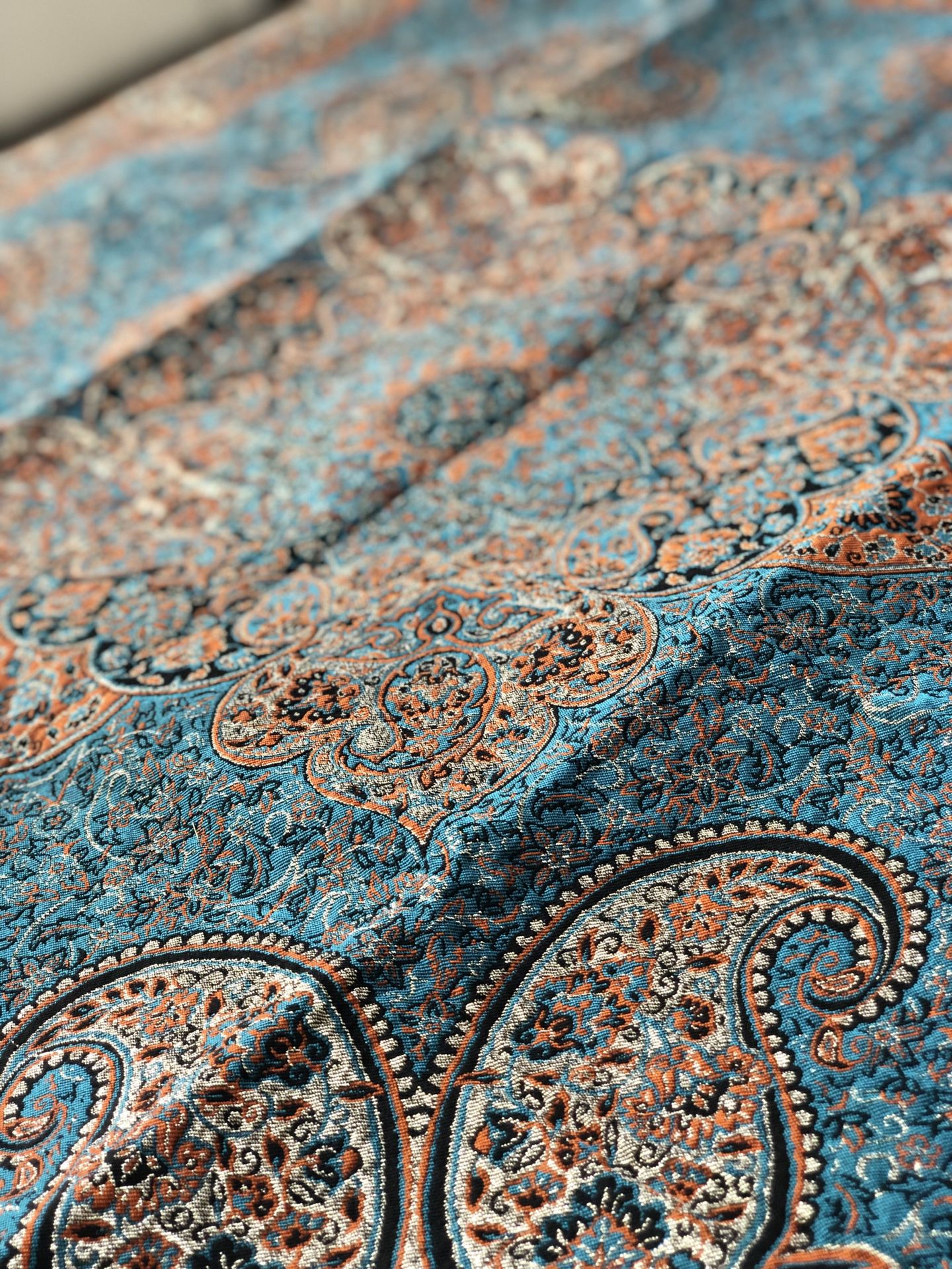 Elegant blue and gold table cover with many details