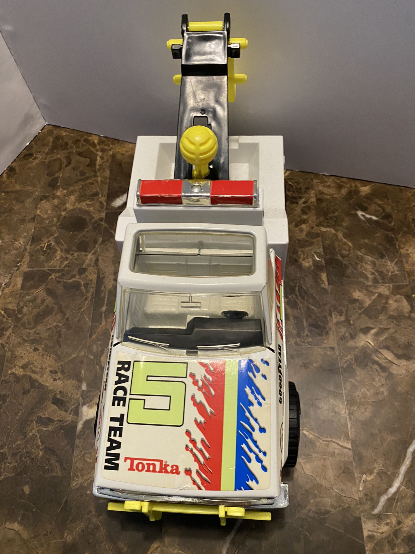 Vintage 1983 Large Tonka tow truck wrecker great condition colors Race Team 5. Measures 14” long.  