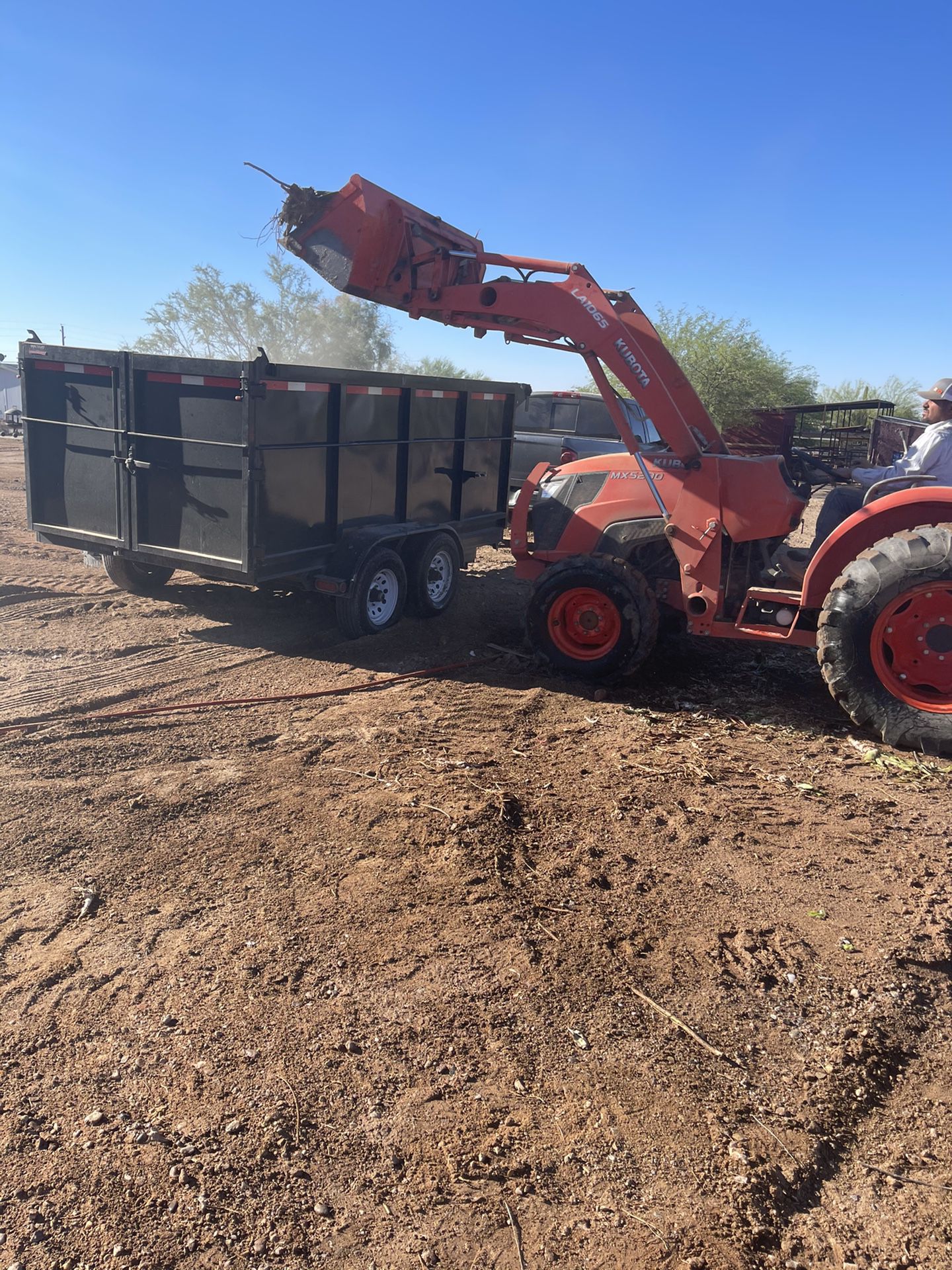 Tractor-skid Steer-excavator-and Dump Trailer Work