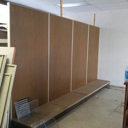 Metal Shelving With Pegboard And A Few Shelves Thumbnail