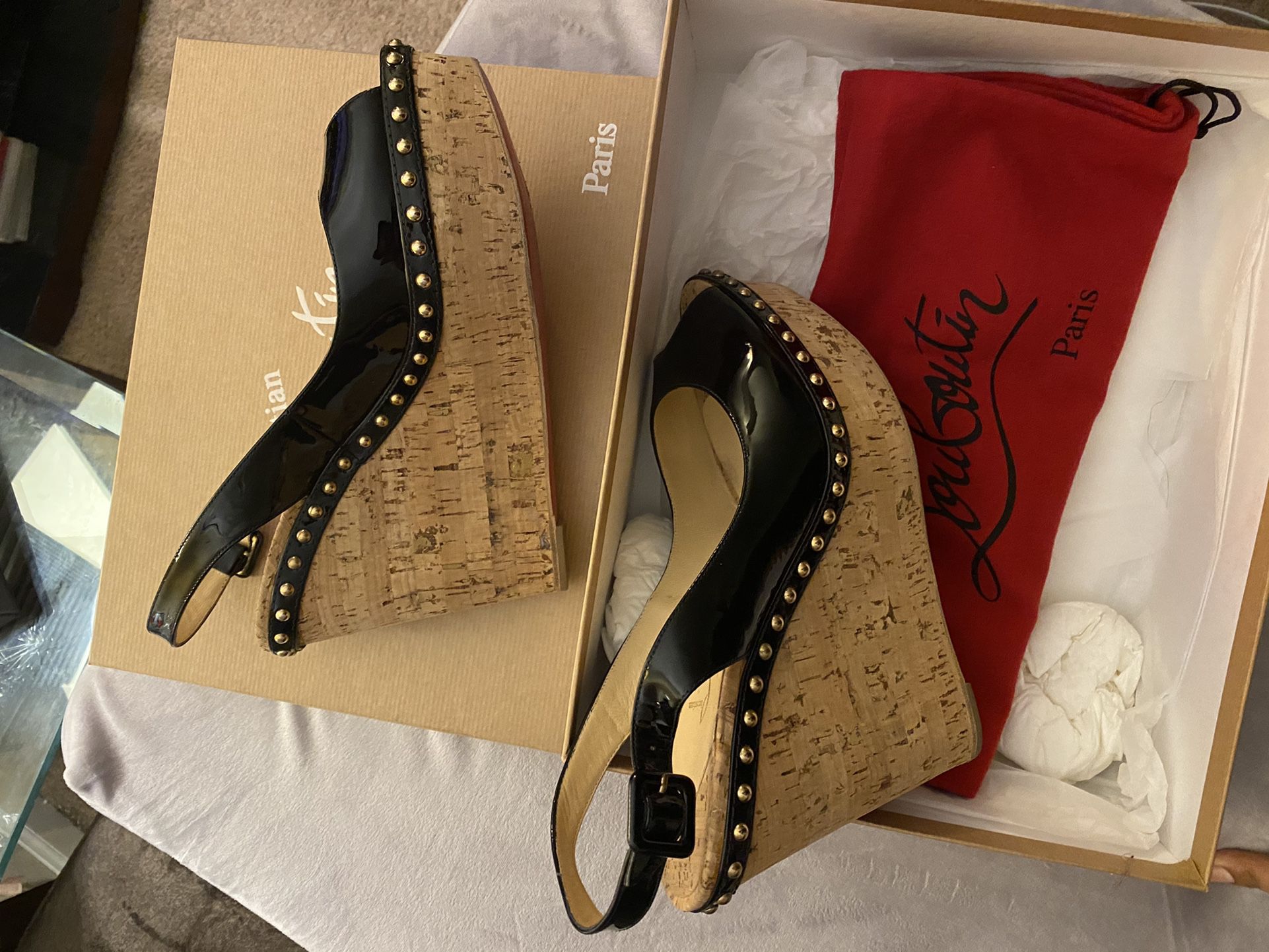 Christian Louboutin “Red Bottoms” Women’s Shoes