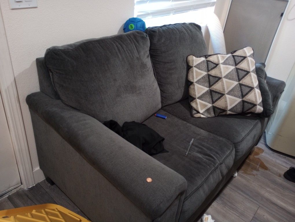 SLIGHTLY USED COUCH SET