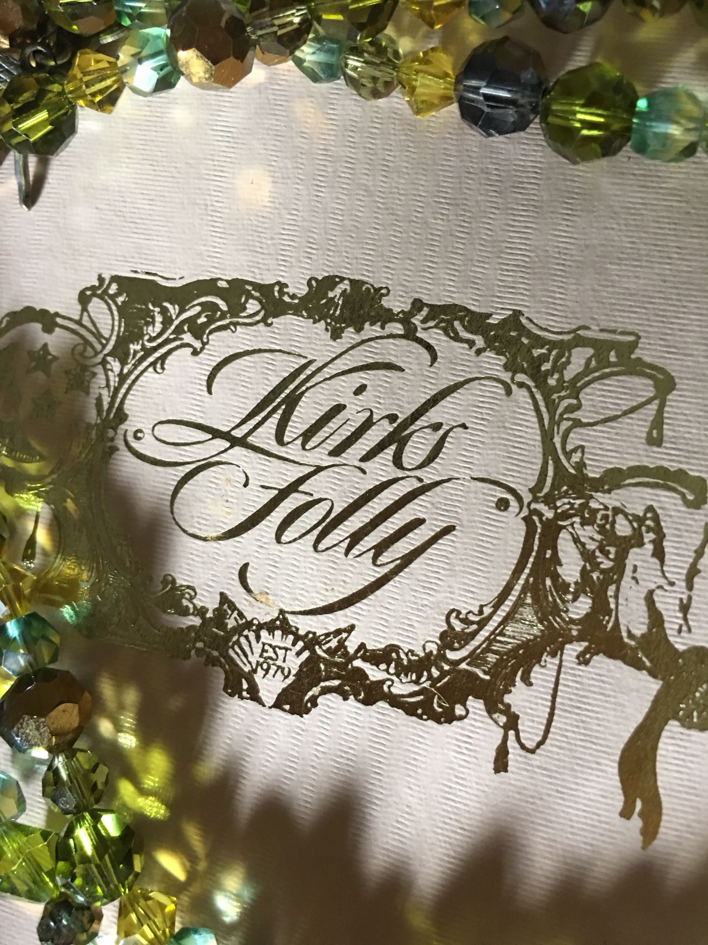 Kirks and Folly jewelry. High quality. In original box. Green butterfly.