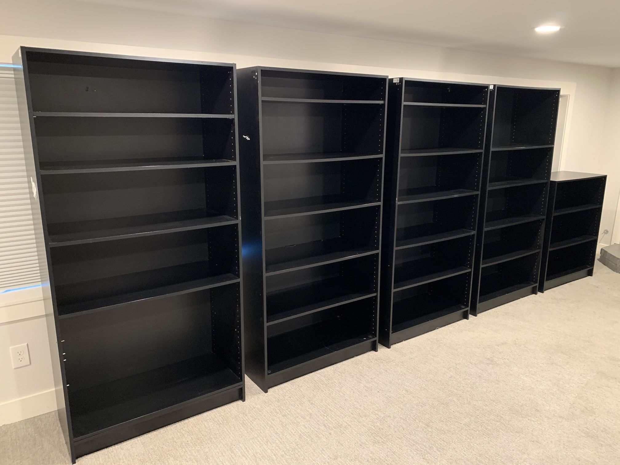 Five Black Adjustable Wood/Particle Board Bookshelves for Sale in