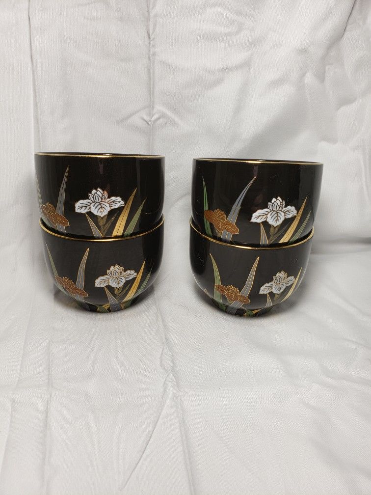 Vintage Ottagiri japan tea cups black with floral design good condition and smoke free home. Measures 2 1/2" T X 3" W .